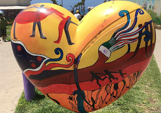 Heart mural art display while at Playas de Tijuana
