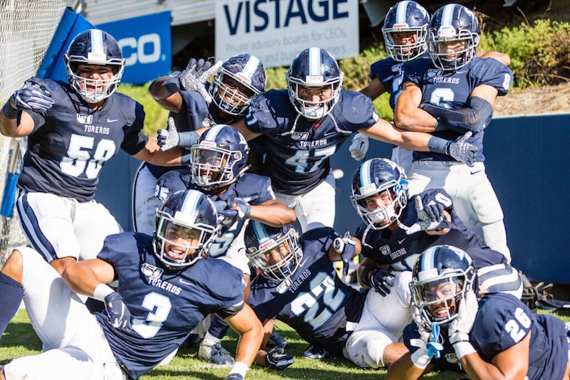 USD Football players posing for camera