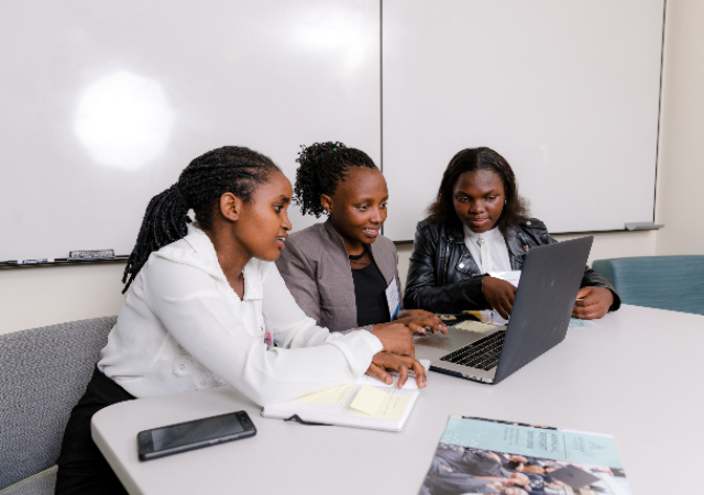 Students working at laptop