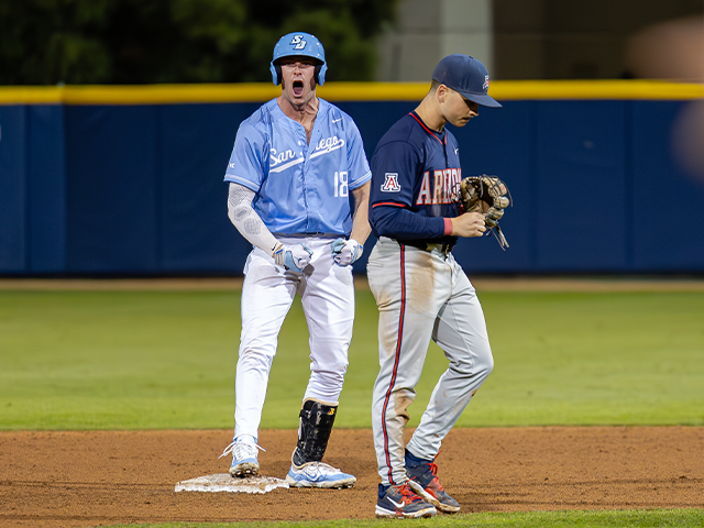 USD baseball player celebrating
