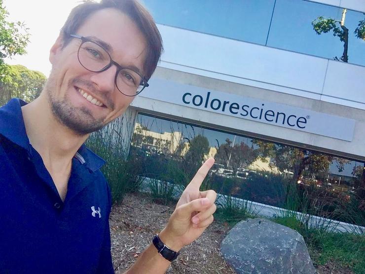 USD exchange student Tim Heitplatz points to the Colorescience office building