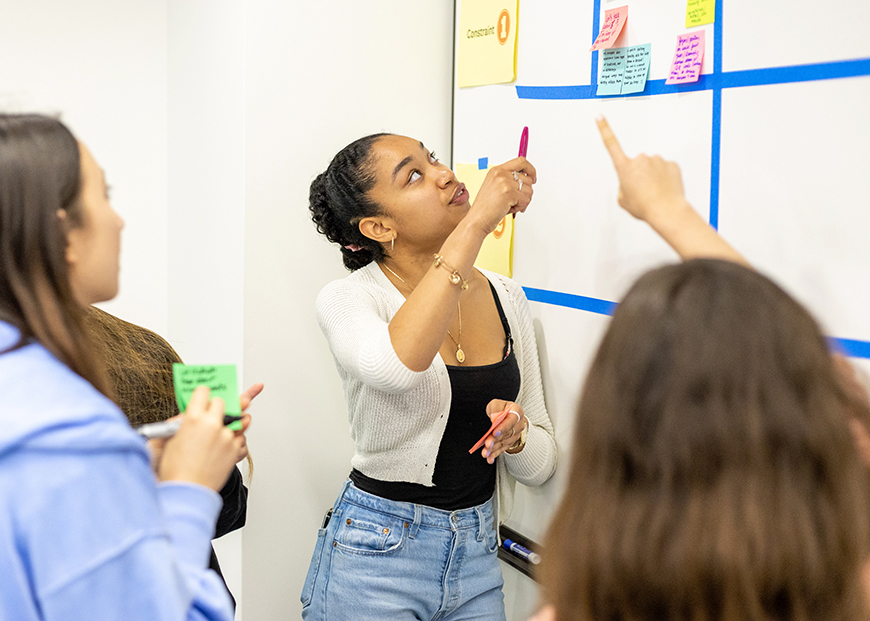 Students brainstorm ideas during a session of the climate alliance. 