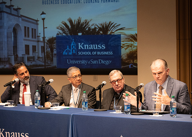USD President Jim Harris talks on a panel. 