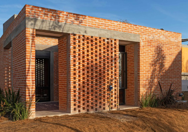 A picture of a one story brick building. 