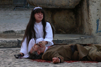 anguished little girl over the body of her murdered father