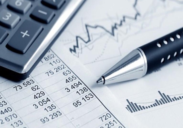 Pen on top of Financial Statistics