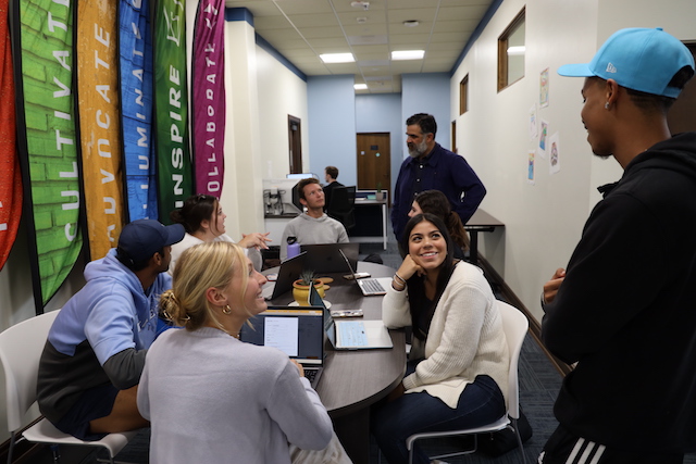 students collaborating in the College Academic District