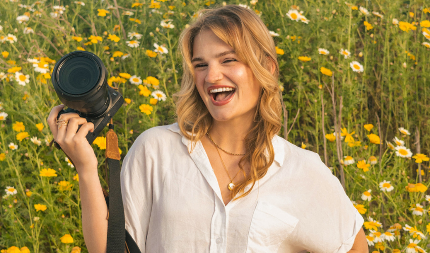 Emma-Kate Squires poses with her camera.