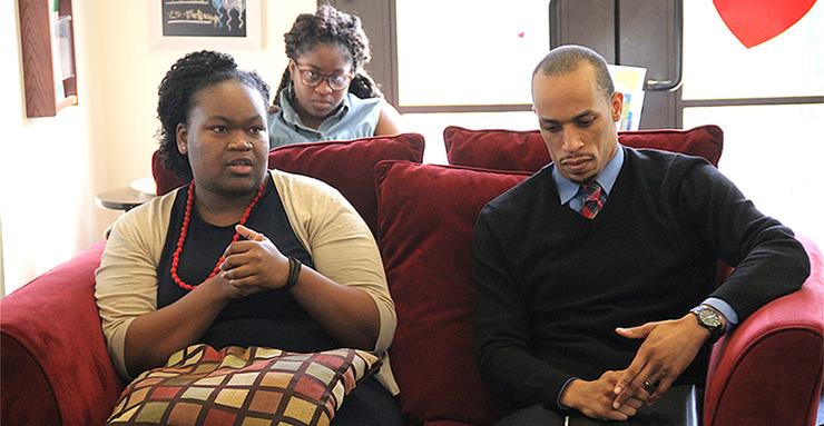 USD Assistant Professor of Mathematics, Candice Price, PhD, speaks as fellow Assistant Professor of Political Science, Cory Gooding, PhD, listens during a Beyond the Classroom event.