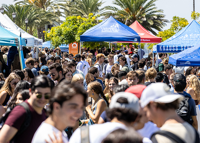 Students walk through Paseo de Colachis for Alcala Bazaar