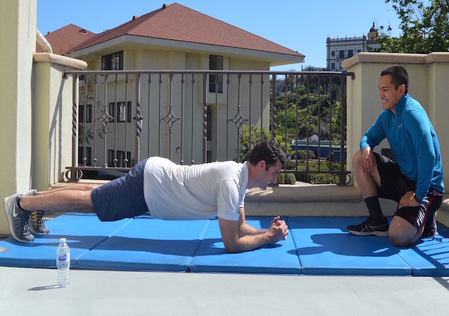 USD Personal Trainer Matt working out with one of his clients at the Mission Fitness Center.