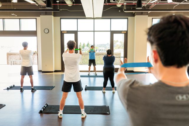 group of students participating in a group fitness class