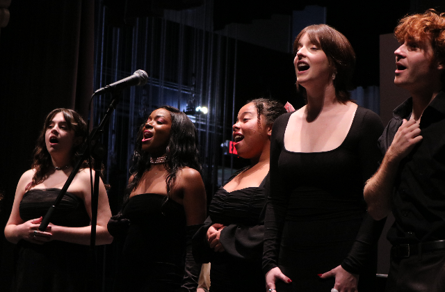 Students from the USD S3 Musical Theatre Ensemble singing on stage during their Fall 2023 performance