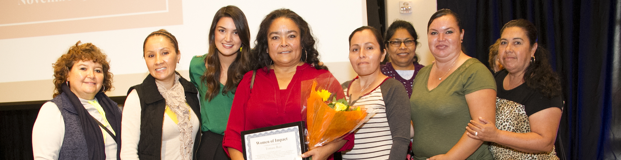 Tomasa Ruiz with Maria Silva and WOI Award