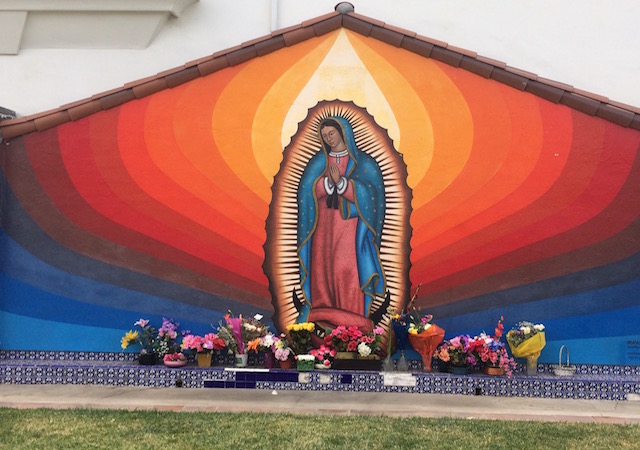 Our Lady of Guadalupe Mural with candles