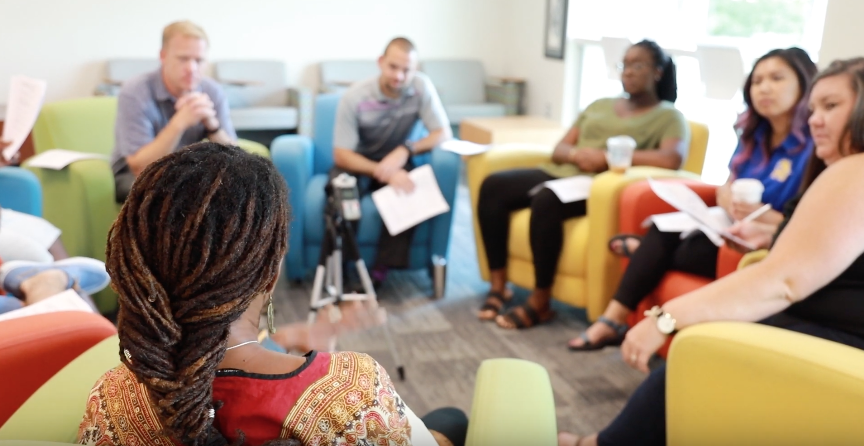 image of restorative justice participants sitting in circle.