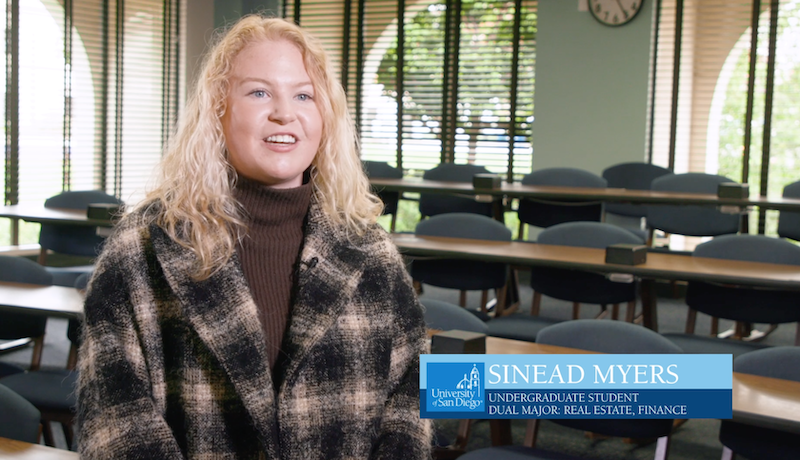 USD School of Business student speaking on camera about learning experience during pandemic