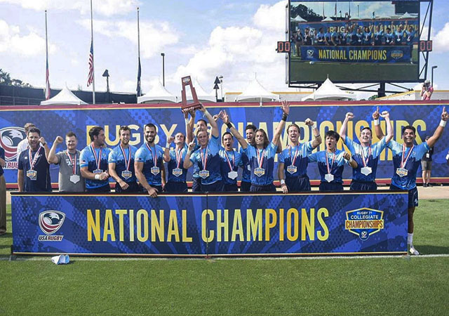 USD Rugby team posing with National Champions banner