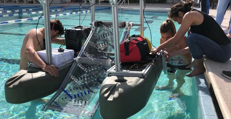 Clear Blue Sea, a prototype for a robotice device to remove plastics and other waste from the ocean, won the Professional Gold Medal Award at the May 10 Engineering and Computing Showcase.