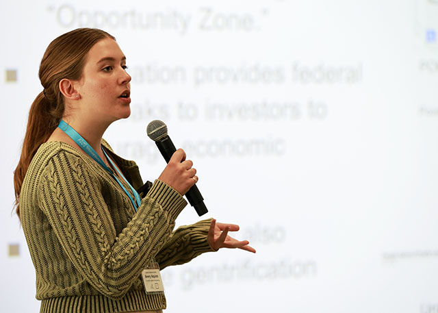 A student-presenter gives a talk during the 34th Creative Collaborations