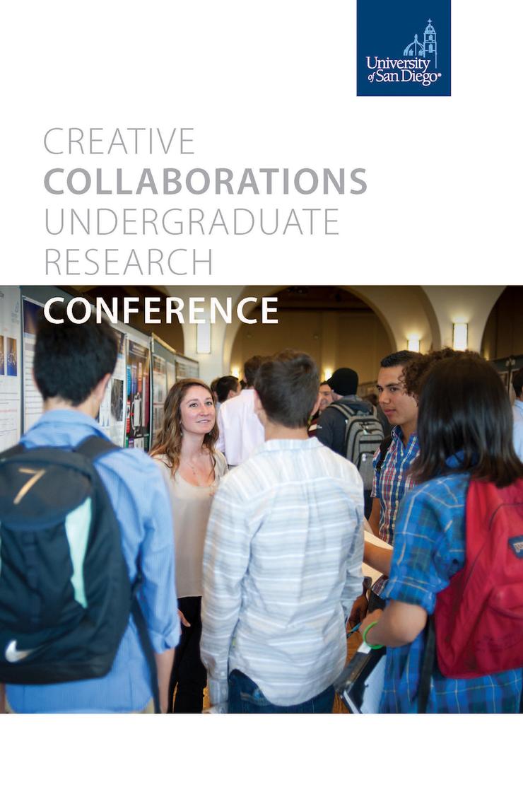 Female student presenting her poster to other students at Creative Collaborations.