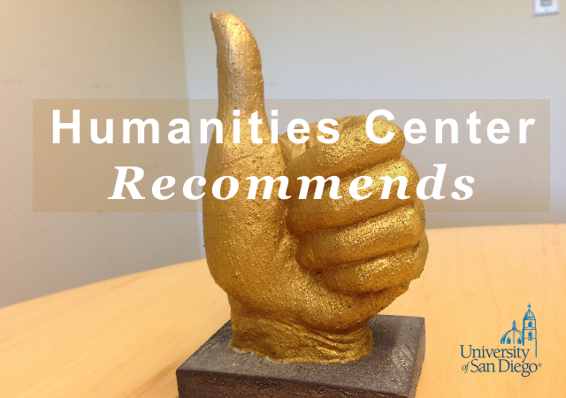 gold statue of a hand giving the thumbs up sign