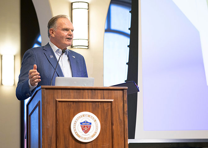 President Harris gives his new student welcome address