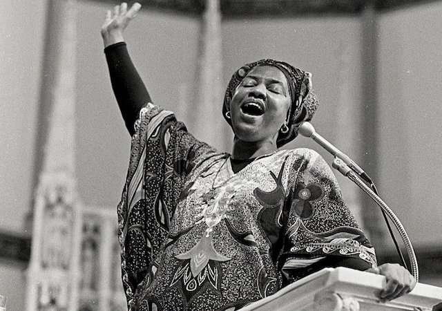 Sister Thea Bowman speaking at a podium