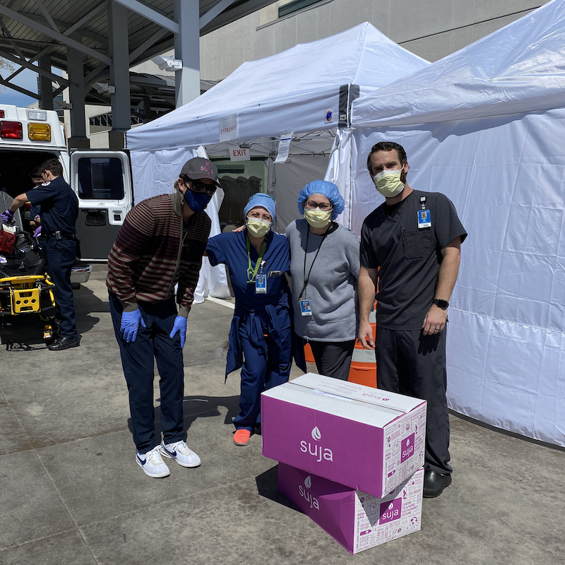 James Brennan and hospital staff with Suja boxes