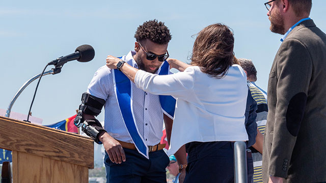 Forty-two USD students were honored during the university’s annual Military-Connected Graduation Ceremony on the flight deck of the USS Midway on May 13.