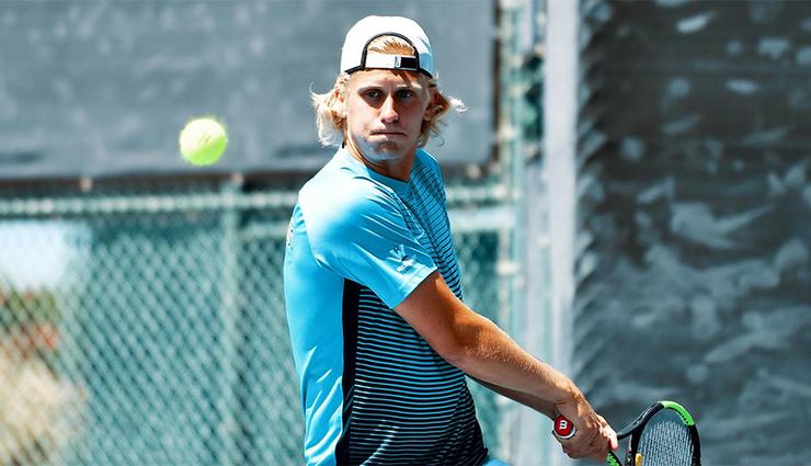 David Norfeldt's singles win in a USD men's tennis match against Pepperdine clinched a 4-2 team win on April 14.