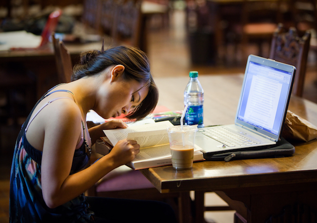Student studying inside Copley Library