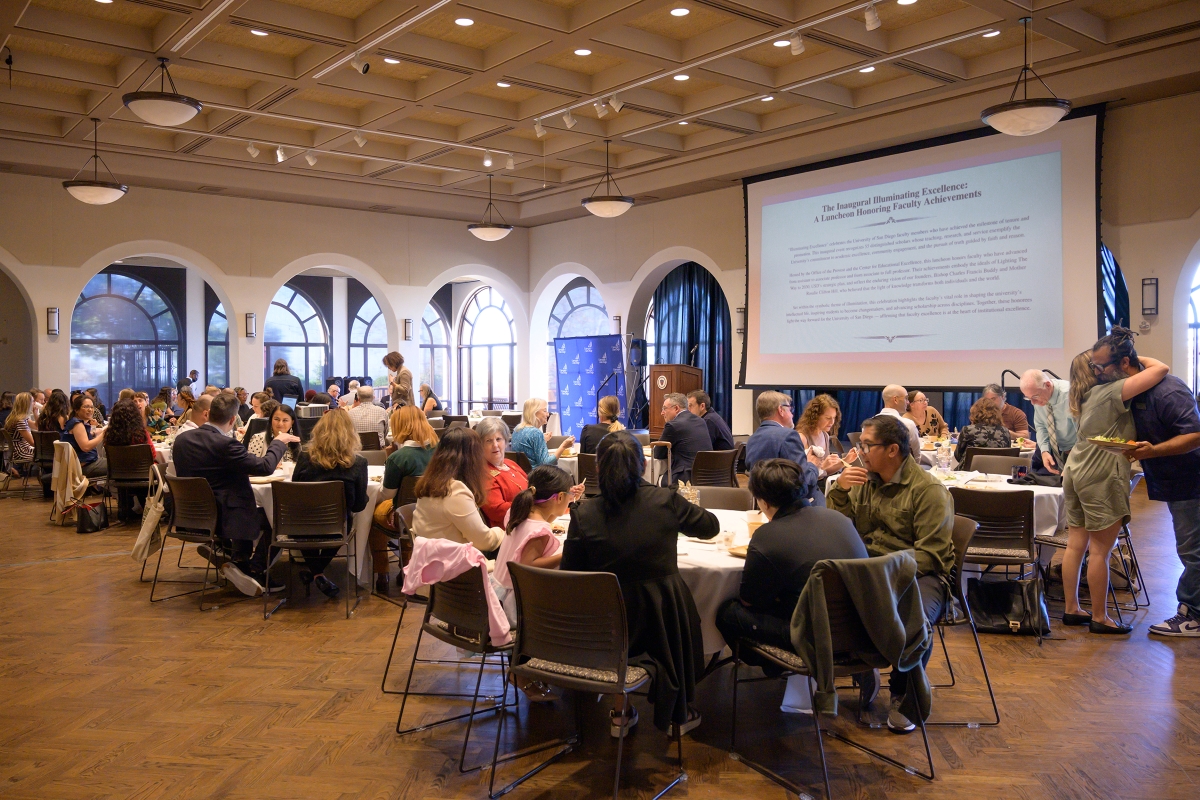 Faculty members, their family and friends, plus USD leadership and colleagues celebrating over lunch.