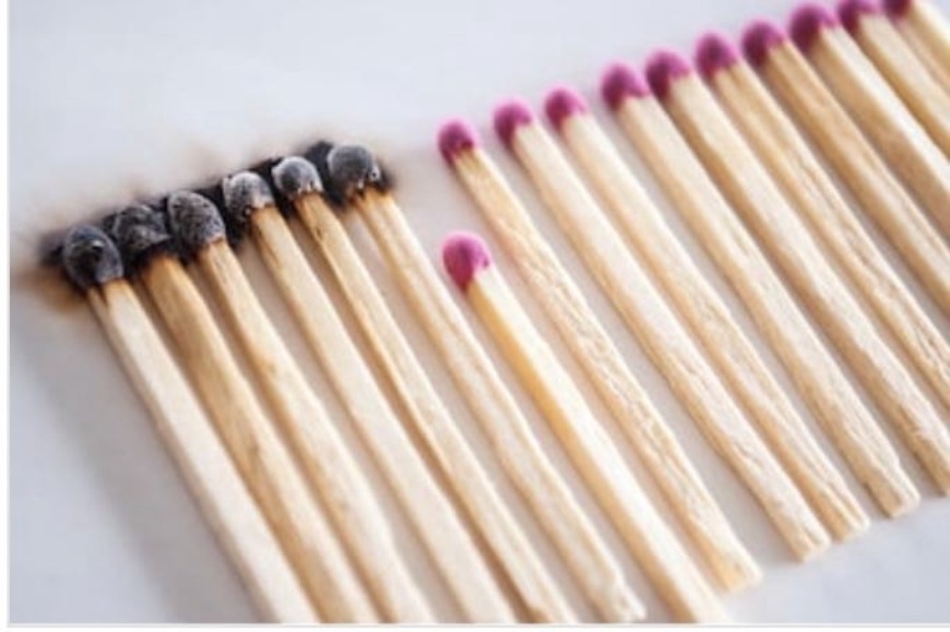matches in a row with several burned and others not.