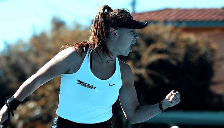 Maria Tyrina celebrates after winning a point in her March 16 match against Yale. The women's tennis team has now won seven straight matches entering WCC play this weekend.