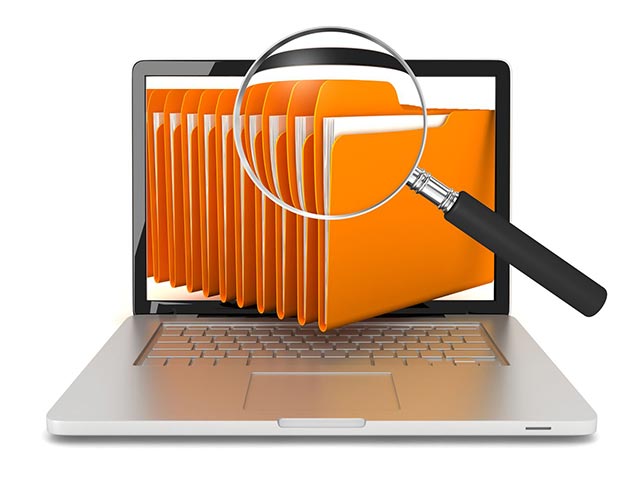 a file folder with a magnifying glass