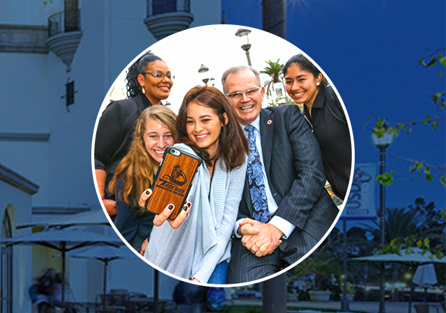 USD students chat with Dr. Harris