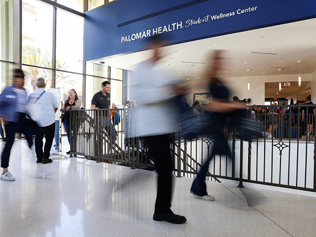People walk through the new wellness center