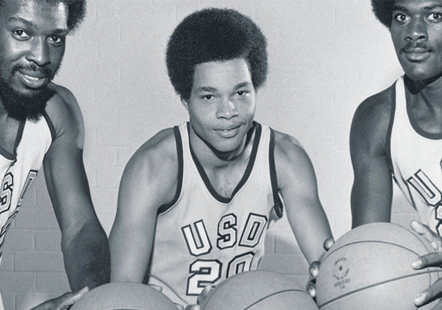 Stan Washington with USD Men's Basketball teammates