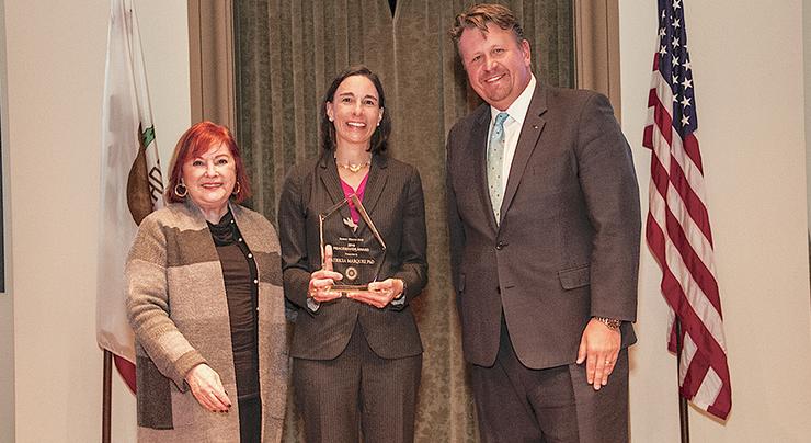 Patricia Marquez accepts Rotary District 5340 Pathways to Peace Award.