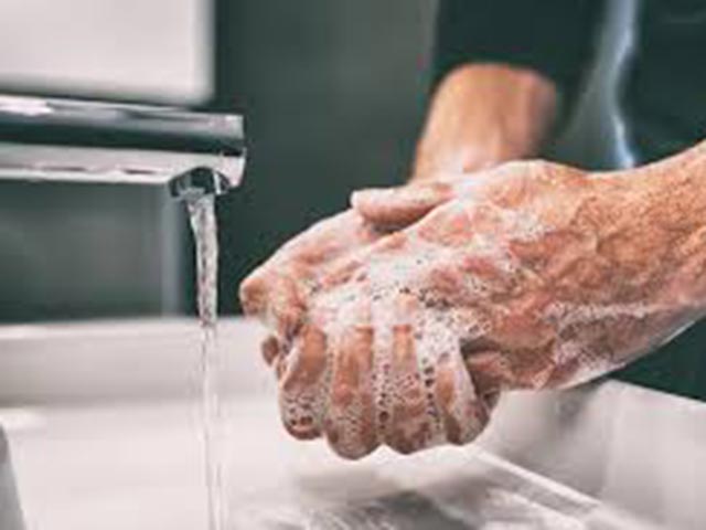 Someone washing their hands